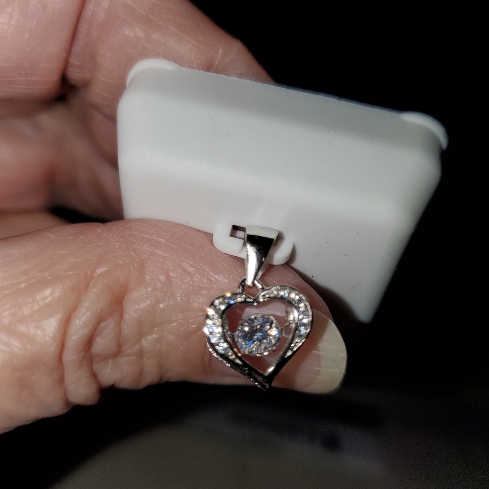 NWT CZ Sterling silver floating heart pendant.